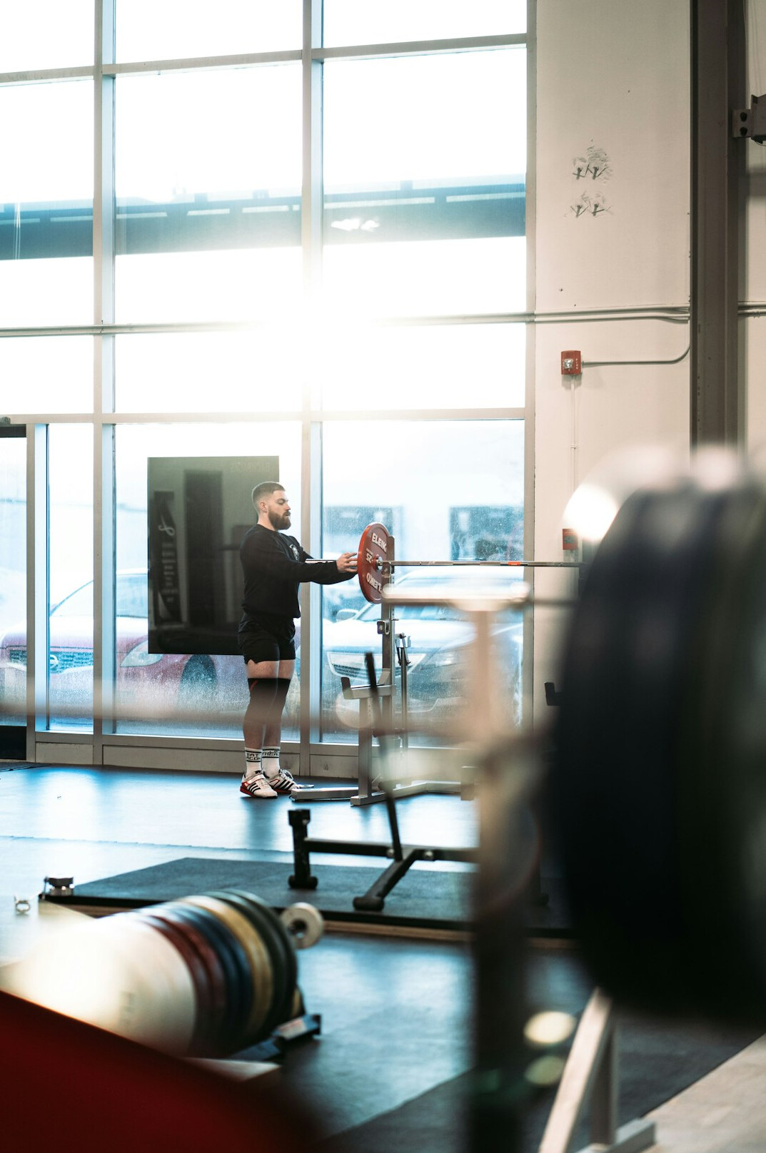 elderly man lifting weights