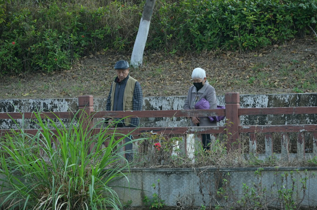 senior couple walking park