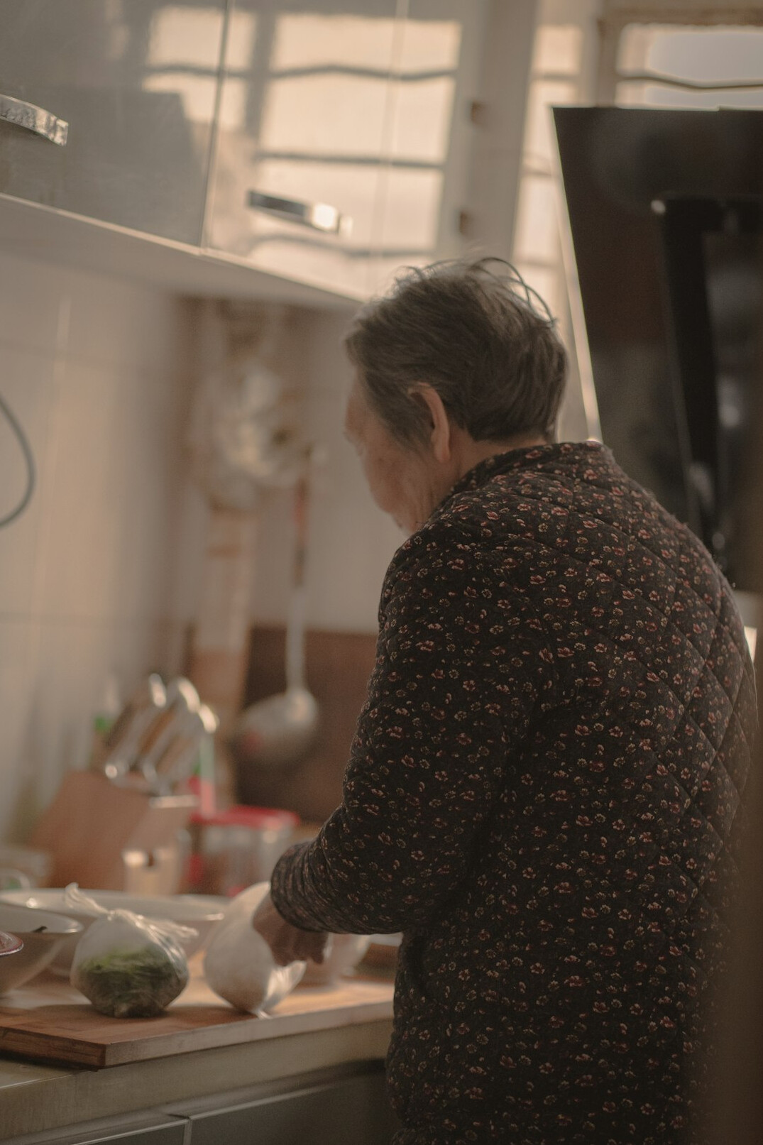 senior cooking healthy meal